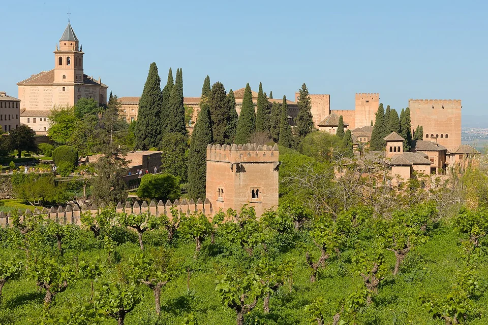 The Alhambra palace and fortress above gardens, viewed from the Generalife